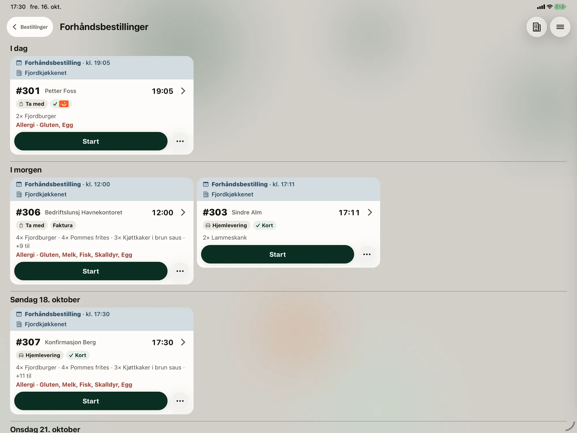 Pre-orders on the kitchen screen, each with its time.